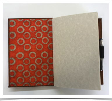 Open Blank Journal with Pen